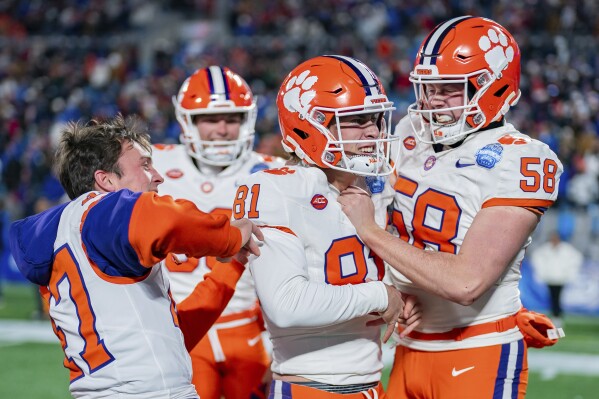 Clemson is ranked in college basketball polls after……